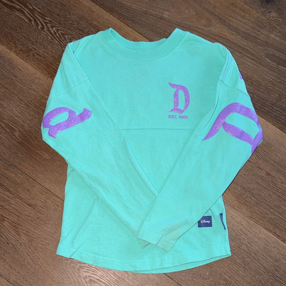 Disneyland Spirit Jersey Turquoise Long Sleeve Shirt with Purple glitter Accents